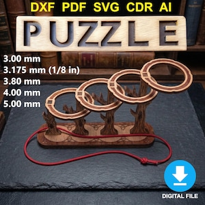 May include: Wooden puzzle featuring the word "PUZZLE" cut out. The puzzle includes a tree-shaped stand with rings and a red string. Measurements are listed in millimeters and inches. The image also includes the text "DIGITAL FILE".