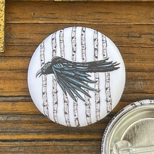 Crow Button Pin – Gothic-Inspired, Matte Finish, and Full of Personality
