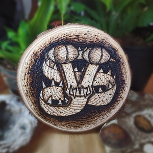 Serpiente quemada en madera - Caracol-Serpiente