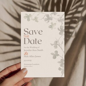 May include: Save the Date card with a floral design in shades of gray and brown. The text reads "Save the Date for the Wedding of Jennifer Ann Smith & Nick Allen James 5-5-2025 Awesome Location details to follow"