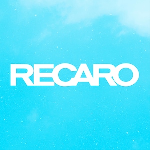 May include: The word "RECARO" in bold white letters is centered against a light blue background with a cloudy effect. The image has a clean, modern aesthetic, with a focus on the brand name.