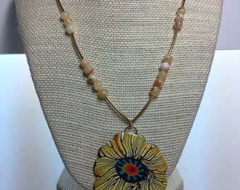 Clay cabochon flower pendant