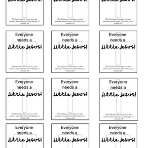 May include: Twelve white square cards with black borders and a black cross in the center. Each card has the text "Everyone needs a little Jesus!" and a Bible verse from Romans 5:8.