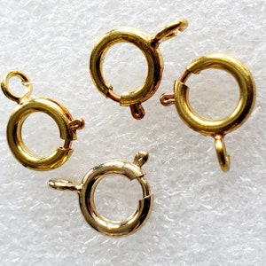Ten Vintage Brass 9mm Spring Ring Clasp