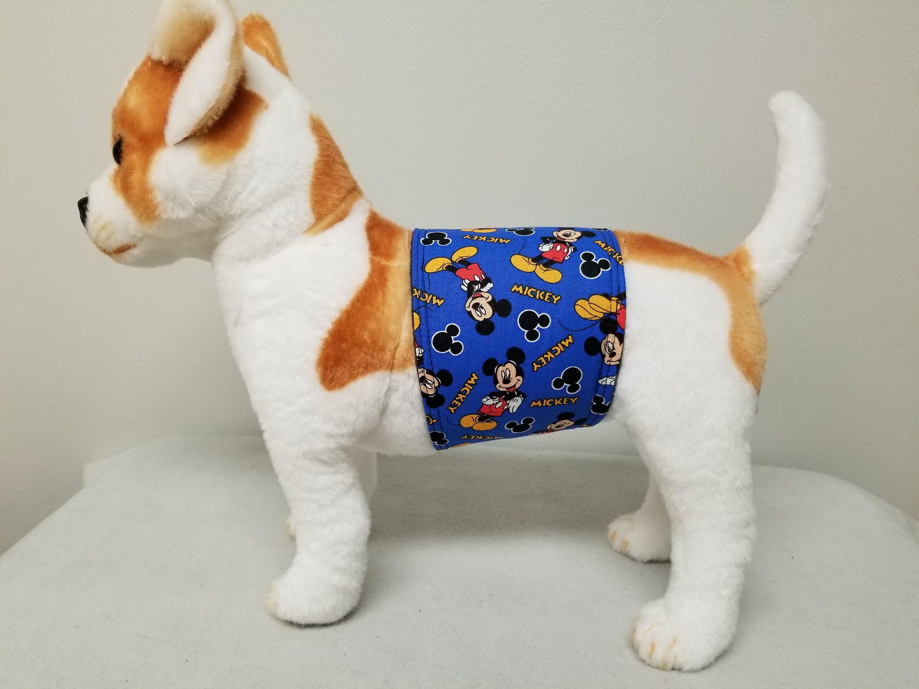 stuffed animal dog with puppies in belly