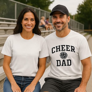 Papá animador, equipo de animadoras, equipo de animadoras, papá entrenador, camiseta unisex de peso pesado teñida en prenda con colores cómodos