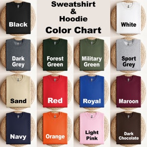a bunch of different colors of shirts