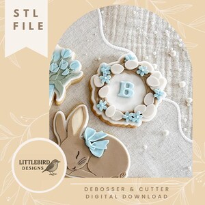 May include: An image featuring decorated Easter-themed cookies. The cookies include a sleeping bunny with a blue bow, a wreath with the letter "B", and a bouquet of flowers. The image also includes the text "STL FILE" and "DEBOSSER & CUTTER DIGITAL DOWNLOAD".
