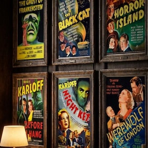 May include: Six framed vintage horror movie posters displayed on a dark wood panelled wall. The posters feature titles including The Ghost of Frankenstein, The Black Cat, Horror Island, Before I Hang, Night Key, and Werewolf of London with illustrations.