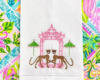 Cheetah pagoda tea towel Linen. Embroidered. Hemstitched .