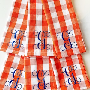Orange check monogrammed cloth dinner napkin. 20x20. Price is for set of four.  monogrammed napkin