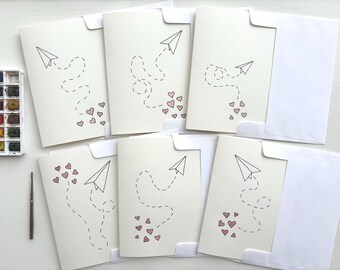 Ensemble de cartes de voeux « Avions en papier avec coeurs » peintes à la main (pas d'impression), aquarelle originale