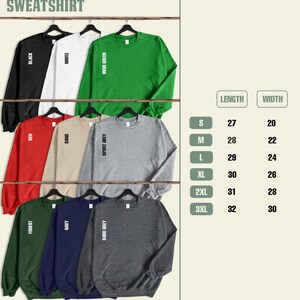 a group of sweatshirts hanging on a clothes line