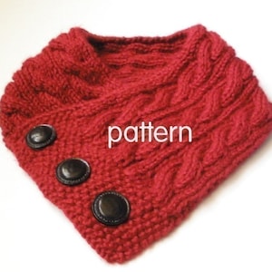 May include: Red knitted cowl with a cable knit pattern and three black buttons.