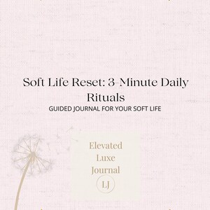 May include: A soft pink journal with gold accents and text that reads "Soft Life Reset: 3-Minute Daily Rituals." The journal also features the text "Guided Journal for Your Soft Life" and the logo for "Elevated Luxe Journal LJ."