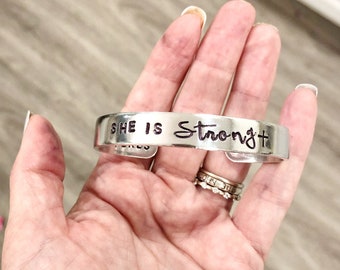 SHE IS STRONG - hand stamped silver cuff bracelet - faith based - Christian jewelry