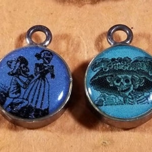 1 charm Catrina et Catrin réversible dans une monture en argent (DR-009)