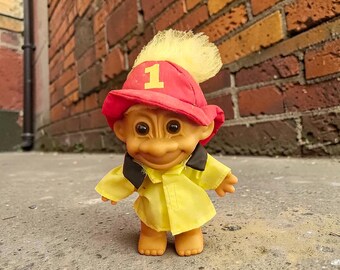 Vintage Firefighter Troll Doll with Vibrant Yellow Hair