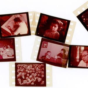 May include: A collection of six vintage 35mm film slides with a reddish tint, featuring various candid scenes including a person writing at a desk, a child, a group of people, and portraits of individuals, all arranged in a scattered layout.