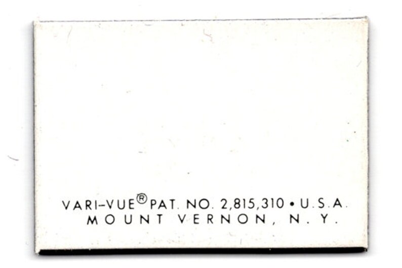 May include: White card with black text that reads "VARI-VUE&reg; PAT. NO. 2,815,310 &bull; U.S.A. MOUNT VERNON, N.Y."
