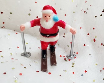 スキーをするサンタの置物やじろべえ 3 - スキーに乗ったサンタの装飾 - カップケーキトッパー - ツリーの下