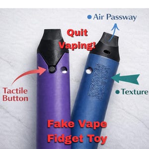 May include: Two fake vape fidget toys, one purple and one blue, with black tops. The purple toy has a tactile button, and the blue one has a texture patch. Text on the image reads "Quit Vaping!" and "Fake Vape Fidget Toy."