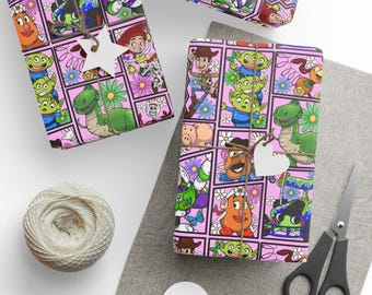 May include: Gift-wrapped presents with a pink background and a repeating pattern of cartoon characters, flowers, and squares. Each package is tied with twine and a white paper tag. A ball of twine and scissors are also visible.