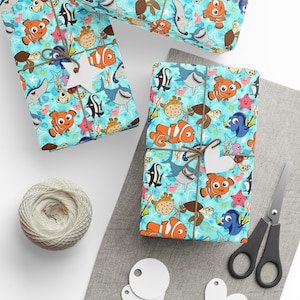 Papeles de regalo de Buscando a Nemo (rollo de 1 unidad)