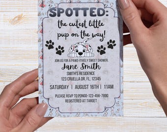 May include: A baby shower invitation with a Dalmatian theme. The invitation reads "SPOTTED: the cutest little pup on the way!" with paw prints and a Dalmatian illustration. The invitation includes the name Jane Smith, date, time, and RSVP information.