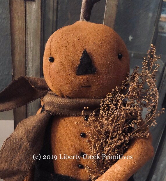 primitive pumpkin doll