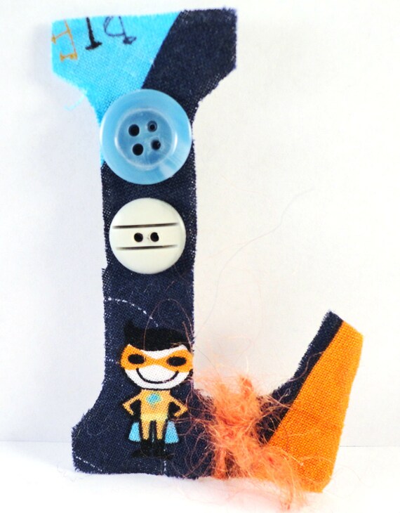 Items similar to Scrapbook embellishments, letter L hero fabric collage