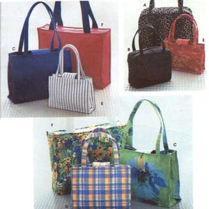 May include: A collection of six different tote bags in various colors and patterns. The bags are made of fabric and have a variety of designs, including floral, plaid, and striped patterns. The bags are all different sizes and shapes.