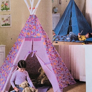 May include: A fabric teepee tent featuring a purple floral pattern with orange and yellow flowers, white support poles at the top, and a solid purple entrance. A second blue teepee tent is shown in the background with a matching blue floor mat.