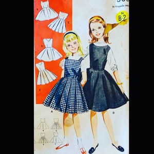 60s Girls Full Skirt Jumper Dress w/ Collar Options and Pleats Vintage Sewing Pattern 9914 Size 7