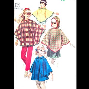 May include: A sewing pattern illustration for children's ponchos in size 4 with a 23-inch breast measurement. The image displays four variations: a red and brown plaid poncho, a yellow hooded poncho, a green and red plaid hooded poncho, and a blue poncho.