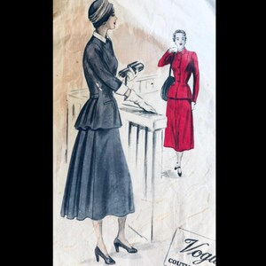 May include: Vintage fashion illustration depicting two women in elegant suits. One is in a dark blue suit with a peplum jacket and skirt. The other wears a red suit. The image includes the Vogue Couture label.
