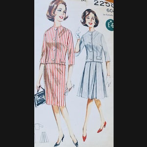 May include: Vintage sewing pattern for a two-piece dress with a skirt and jacket. The pattern is for sizes 6-16 and is from the 1960s. The dress is striped and has a fitted jacket with a collar and buttons.