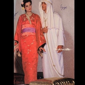 May include: A woman in a red kimono with a purple obi and a man in a white robe and headdress. The kimono has a bamboo leaf pattern. The man's robe is paired with a gold rope. The word "Japan" is written on the left and "Egypt" on the right.