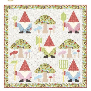 May include: A colorful quilt featuring gnomes with red hats and various tools, standing near mushroom-shaped houses. The word "Nomenclature" is at the top. The quilt has a dotted background and a striped border. The bottom has a logo that says "Seriously, I think it needs stitches."