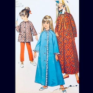 May include: Vintage sewing pattern featuring illustrations of girls' sleepwear. The designs include a quilted jacket and pants set, a long blue robe with white trim, and a patterned robe with a bow. The text indicates the pattern is for a girl, size 14, with a 32-inch bust.
