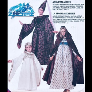 May include: Image of three medieval costumes for girls and misses. The costumes include a long purple dress with a matching hat, a white dress with gold trim, and a floral dress with a brown hooded cape. The text reads "Medieval Magic".