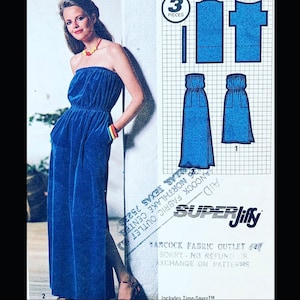 May include: A blue strapless maxi dress with a gathered waist and pockets. The dress is shown on a woman. A pattern for the dress is shown on the right. The pattern includes the text "SUPER Jiffy" and "HANCOCK FABRIC OUTLET".
