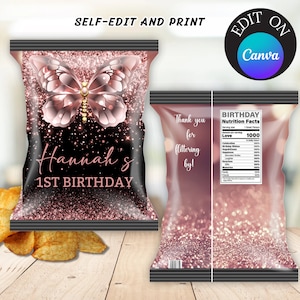 May include: Printable chip bag template featuring a pink butterfly with glitter accents on a black background. The text "Hannah's 1st Birthday" is printed on the front of the bag. The back of the bag has a pink glitter background with the text "Thank you for glittering by!" and a mock nutrition label with the text "Birthday Nutrition Facts".