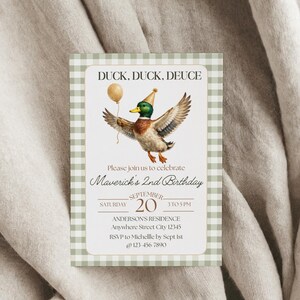 May include: Birthday invitation with a watercolor illustration of a duck wearing a party hat and holding a balloon. The invitation reads "DUCK, DUCK, DEUCE" and invites guests to celebrate Maverick's 2nd Birthday on September 20th.