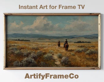 May include: A framed landscape painting featuring two figures on horseback traversing a vast, golden field under a cloudy sky. The artwork, with a vintage aesthetic, is labeled "Instant Art for Frame TV" and "ArtifyFrameCo".
