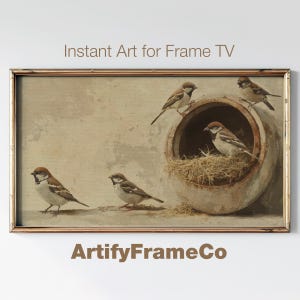 May include: A framed print of a vintage-style illustration featuring five brown sparrows perched on a clay pot with a nest inside. The background is a light beige with a faded, textured look.