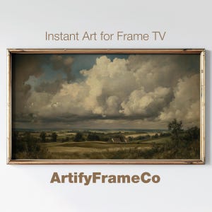 Könnte beinhalten: Ein gerahmtes Landschaftsgemälde, das eine ländliche Szene mit einem bewölkten Himmel und einem Blick auf ein Gewässer in der Ferne zeigt. Das Gemälde ist in einem goldenen Rahmen und hat einen rustikalen Charakter.