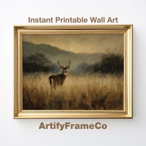 Pode incluir: Uma impressão emoldurada com um veado num campo, com o texto "Instant Printable Wall Art" e "ArtifyFrameCo". A obra de arte tem uma paleta de cores quentes com uma moldura dourada, retratando uma paisagem serena.