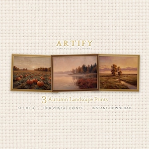 May include: A set of three horizontal landscape prints in gold frames. The left print shows a pumpkin patch at sunset. The center print depicts a misty lake with trees. The right print features a stream in a field. Text reads ARTIFY VINTAGE DIGITAL PRINTS and 3 Autumn Landscape Prints.