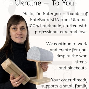 a woman holding a wooden object, possibly a piece of furniture or a tool, and posing for the camera. The text in the image provides information about a business, including the name of the business owner, the nature of the business, and the products they offer. The text also mentions that the business supports small family businesses in Ukraine.